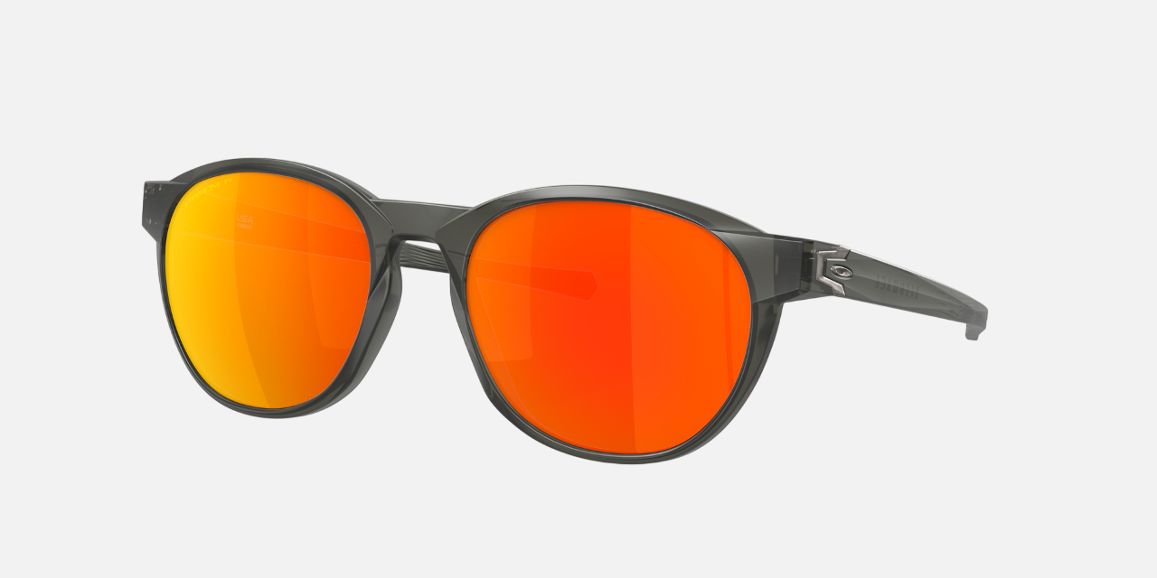 Oakley Reedmace 03 round sunglasses for men in full rim plastic, with grey frame, and blue lenses. 54mm in lens size, 18mm in bridge size, and 137mm in temple length.