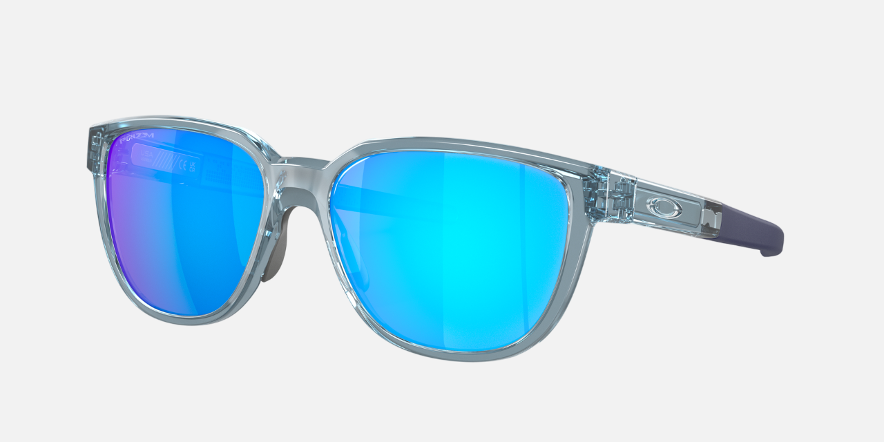 Oakley Actuator 06 rectangular sunglasses for men in full rim plastic, with grey frame, and blue lenses. 57mm in lens size, 16mm in bridge size, and 146mm in temple length.
