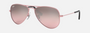 Ray-Ban Junior Aviator Kids RJ9506S 211/7E pilot sunglasses for kids in full rim metal, with polished pink frame, and pink lenses. 52mm in lens size, 14mm in bridge size, and 125mm in temple length.