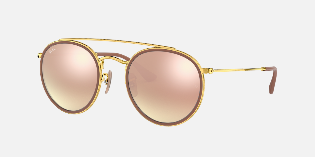 Ray-Ban Round Double Bridge RB3647N 001/7O round double bridge sunglasses for unisex in full rim metal, with gold frame, and brown mirror lenses. 51mm in lens size, 22mm in bridge size, and 145mm in temple length.