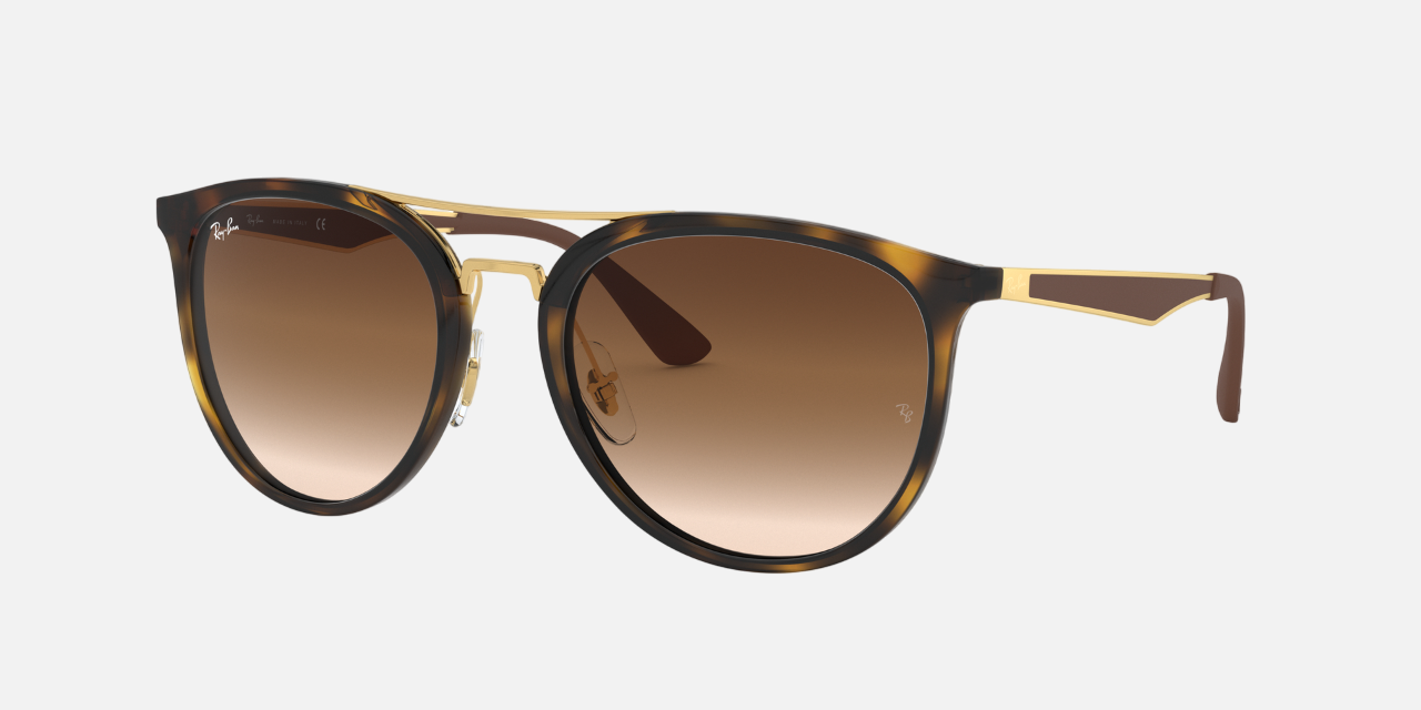 Ray-Ban RB4285 710/13 phantos sunglasses for unisex in full rim injected, with polished light havana frame, and brown gradient lenses. 55mm in lens size, 20mm in bridge size, and 145mm in temple length.