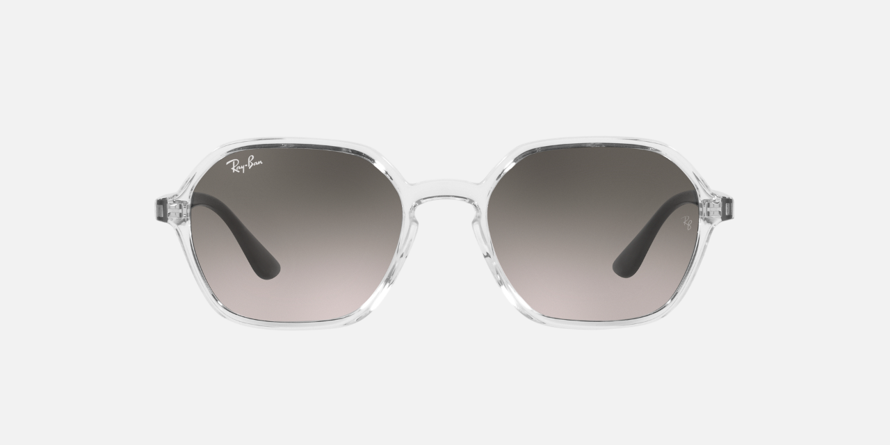Ray-Ban RB4361 647711 irregular sunglasses for unisex in full rim plastic, with transparent frame, and grey gradient lenses. 52mm in lens size, 18mm in bridge size, and 145mm in temple length.