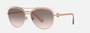 Bvlgari BV6164B 20143B aviator sunglasses for women in full rim metal, with pink gold/transparent pink frame, and pink gradient grey lenses. 57mm in lens size, 15mm in bridge size, and 140mm in temple length.