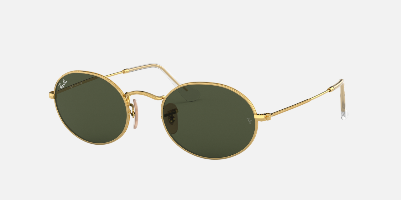 Ray-Ban Oval Metal RB3547 001/31 oval sunglasses for unisex in full rim metal, with gold frame, and green lenses. 51mm in lens size, 21mm in bridge size, and 145mm in temple length.