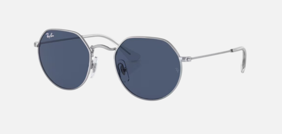 Ray-Ban Junior Jack Kids RJ9565S 212/80 irregular sunglasses for kids in full rim metal, with polished silver frame, and dark blue lenses. 47mm in lens size, 19mm in bridge size, and 130mm in temple length.