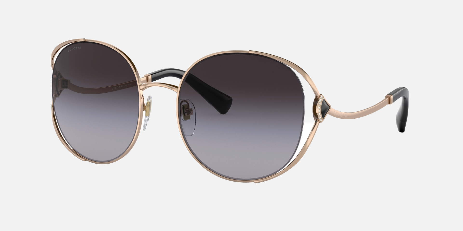 Bvlgari BV6181B 20148G round sunglasses for women in semi-rimless metal, with pink gold frame, and grey gradient lenses. 57mm in lens size, 20mm in bridge size, and 140mm in temple length.