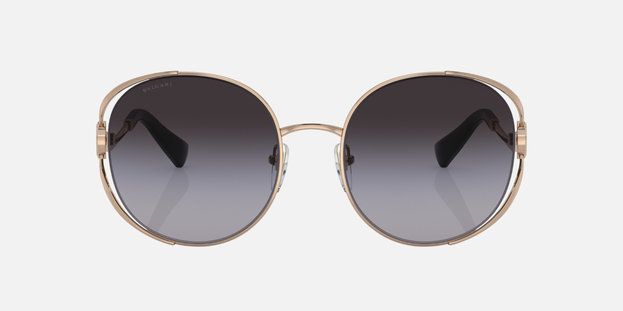 Bvlgari BV6181B 20148G round sunglasses for women in semi-rimless metal, with pink gold frame, and grey gradient lenses. 57mm in lens size, 20mm in bridge size, and 140mm in temple length.