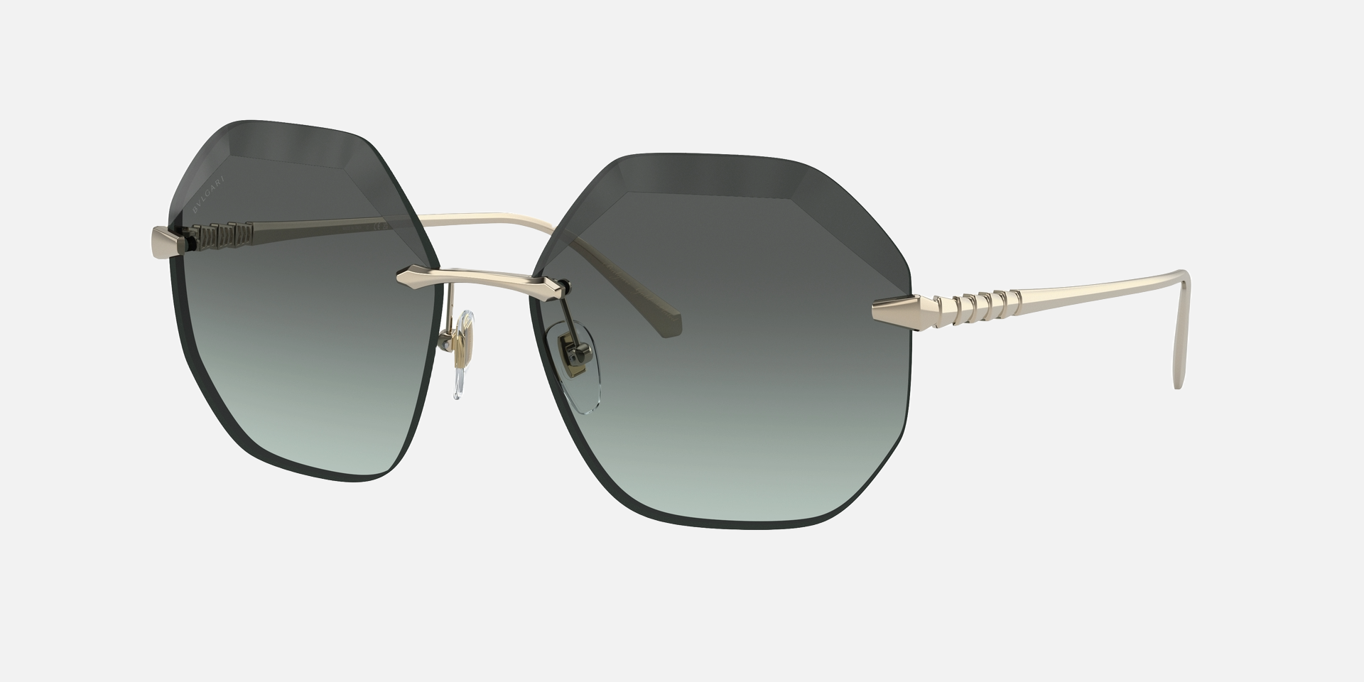 Bvlgari BV6187K 278/2A irregular sunglasses for women in rimless metal, with pale gold plated frame, and green gradient lenses. 59mm in lens size, 16mm in bridge size, and 140mm in temple length.