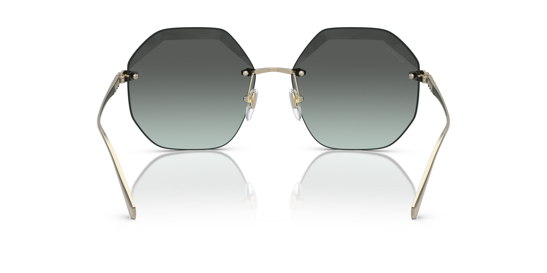 Bvlgari BV6187K 278/2A irregular sunglasses for women in rimless metal, with pale gold plated frame, and green gradient lenses. 59mm in lens size, 16mm in bridge size, and 140mm in temple length.