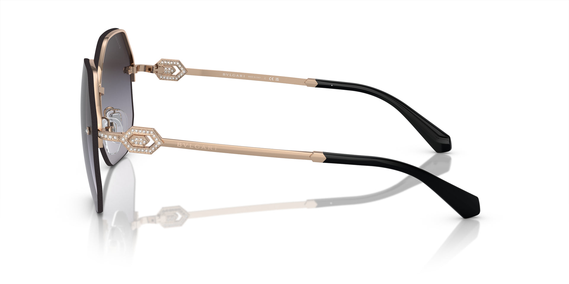 Bvlgari BV6122B 20148G irregular sunglasses for women in full rim metal, with pink gold frame, and grey gradient lenses. 58mm in lens size, 16mm in bridge size, and 140mm in temple length.