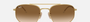 Ray-Ban RB3707 001/51 hexagonal sunglasses for unisex in full rim metal, with gold frame, and brown lenses.