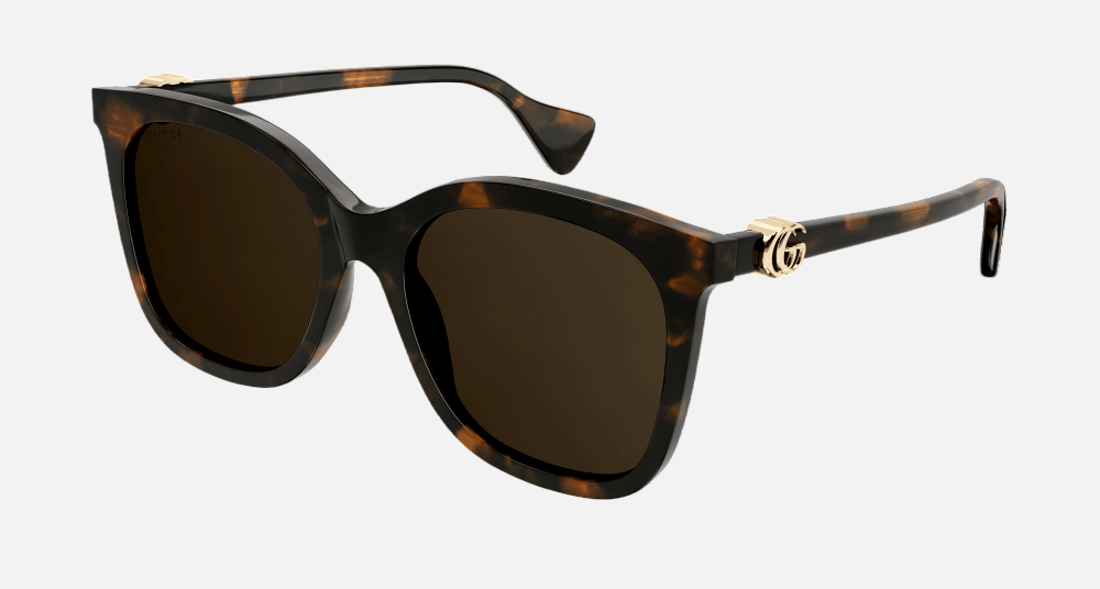 Gucci GG1071S 002 cat-eye sunglasses for women in full rim plastic, with dark havana frame, and brown lenses. 55mm in lens size, 19mm in bridge size, and 145mm in temple length.