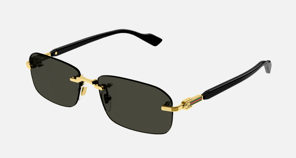 Gucci GG1221S 001 rectangular sunglasses for men in rimless metal, with gold frame, and grey lenses. 56mm in lens size, 16mm in bridge size, and 140mm in temple length.