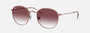 Ray-Ban Junior Rob Kids RJ9572S 291/8H irregular sunglasses for kids in full rim metal, with polished rose gold frame, and violet lenses. 48mm in lens size, 19mm in bridge size, and 130mm in temple length.