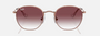 Ray-Ban Junior Rob Kids RJ9572S 291/8H irregular sunglasses for kids in full rim metal, with polished rose gold frame, and violet lenses. 48mm in lens size, 19mm in bridge size, and 130mm in temple length.