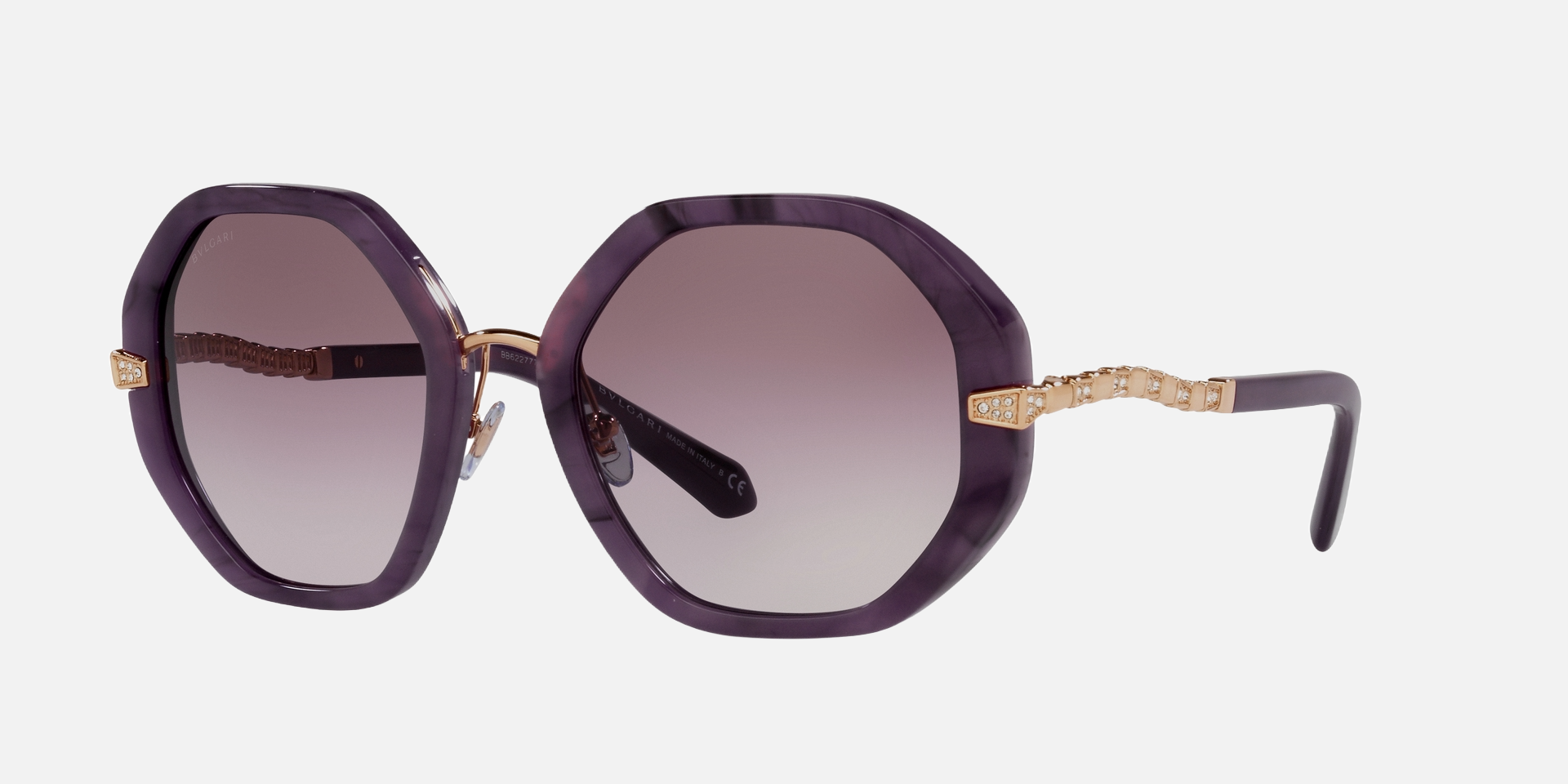 Bvlgari BV8242B 55178H irregular sunglasses for women in full rim plastic, with marbled amethyst frame, and violet gradient lenses. 55mm in lens size, 21mm in bridge size, and 140mm in temple length.