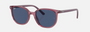 Ray-Ban Junior Elliot Kids RJ9097S 711280 irregular sunglasses for kids in full rim nylon, with transparent pink frame, and dark blue lenses. 46mm in lens size, 16mm in bridge size, and 130mm in temple length.