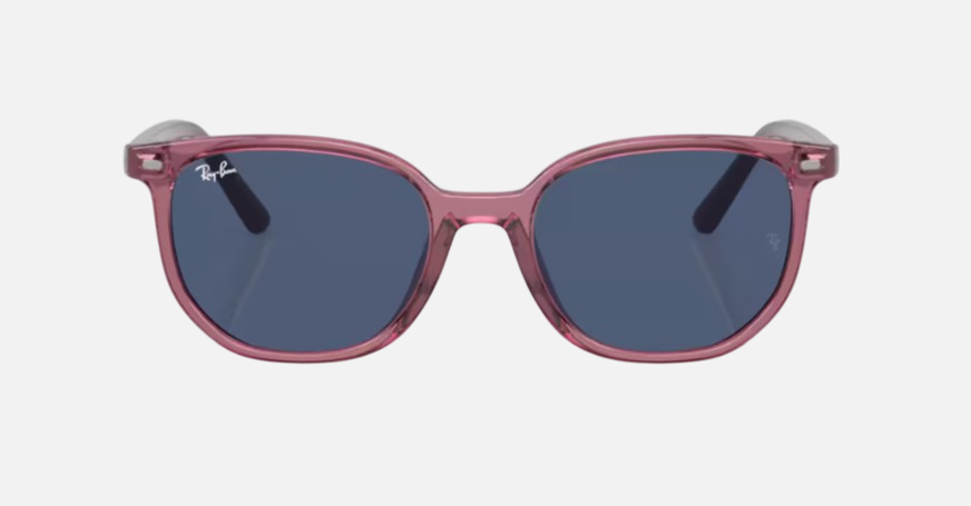 Ray-Ban Junior Elliot Kids RJ9097S 711280 irregular sunglasses for kids in full rim nylon, with transparent pink frame, and dark blue lenses. 46mm in lens size, 16mm in bridge size, and 130mm in temple length.