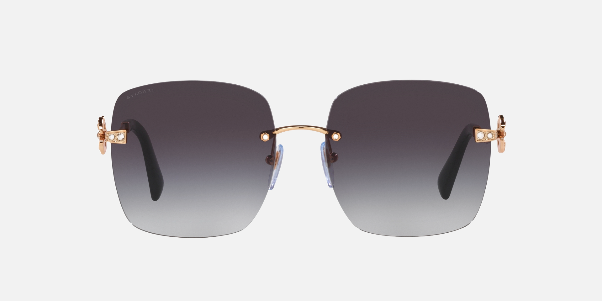 Bvlgari BV6173B 20148G square sunglasses for women in rimless metal, with pink gold frame, and grey gradient lenses. 58mm in lens size, 17mm in bridge size, and 140mm in temple length.