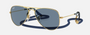 Ray-Ban Junior Aviator Kids RJ9506S 223/1U pilot sunglasses for kids in full rim metal, with polished arista gold
  frame, and light blue mirror lenses. 52mm in lens size, 14mm in bridge size, and 125mm in temple length.
