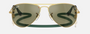 Ray-Ban Junior Aviator Kids RJ9506S 223/6R pilot sunglasses for kids in full rim metal, with polished arista gold frame, and green mirror lenses. 52mm in lens size, 14mm in bridge size, and 125mm in temple length.
