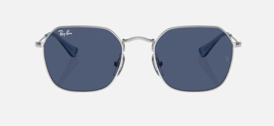 Ray-Ban Junior RJ9594S 212/80 irregular sunglasses for kids in full rim metal, with silver frame, and dark blue lenses. 49mm in lens size, 19mm in bridge size, and 130mm in temple length.