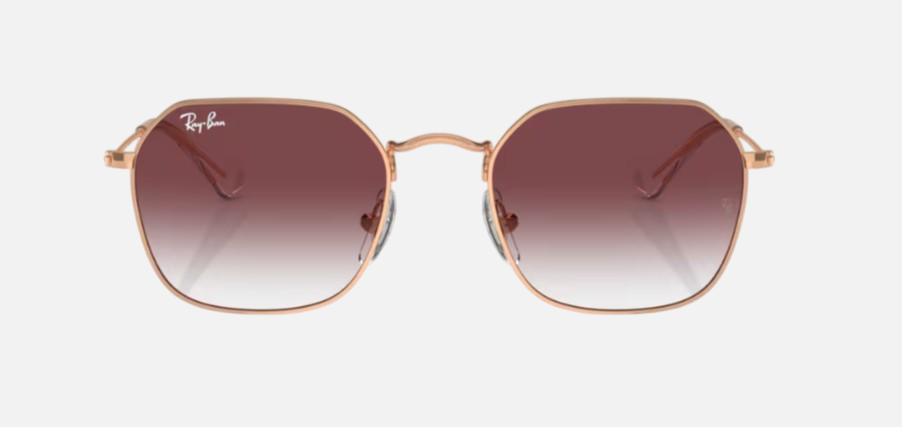 Ray-Ban Junior RJ9594S 291/8H irregular sunglasses for kids in full rim metal, with polished rose gold frame, and clear & dark violet lenses. 49mm in lens size, 19mm in bridge size, and 130mm in temple length.