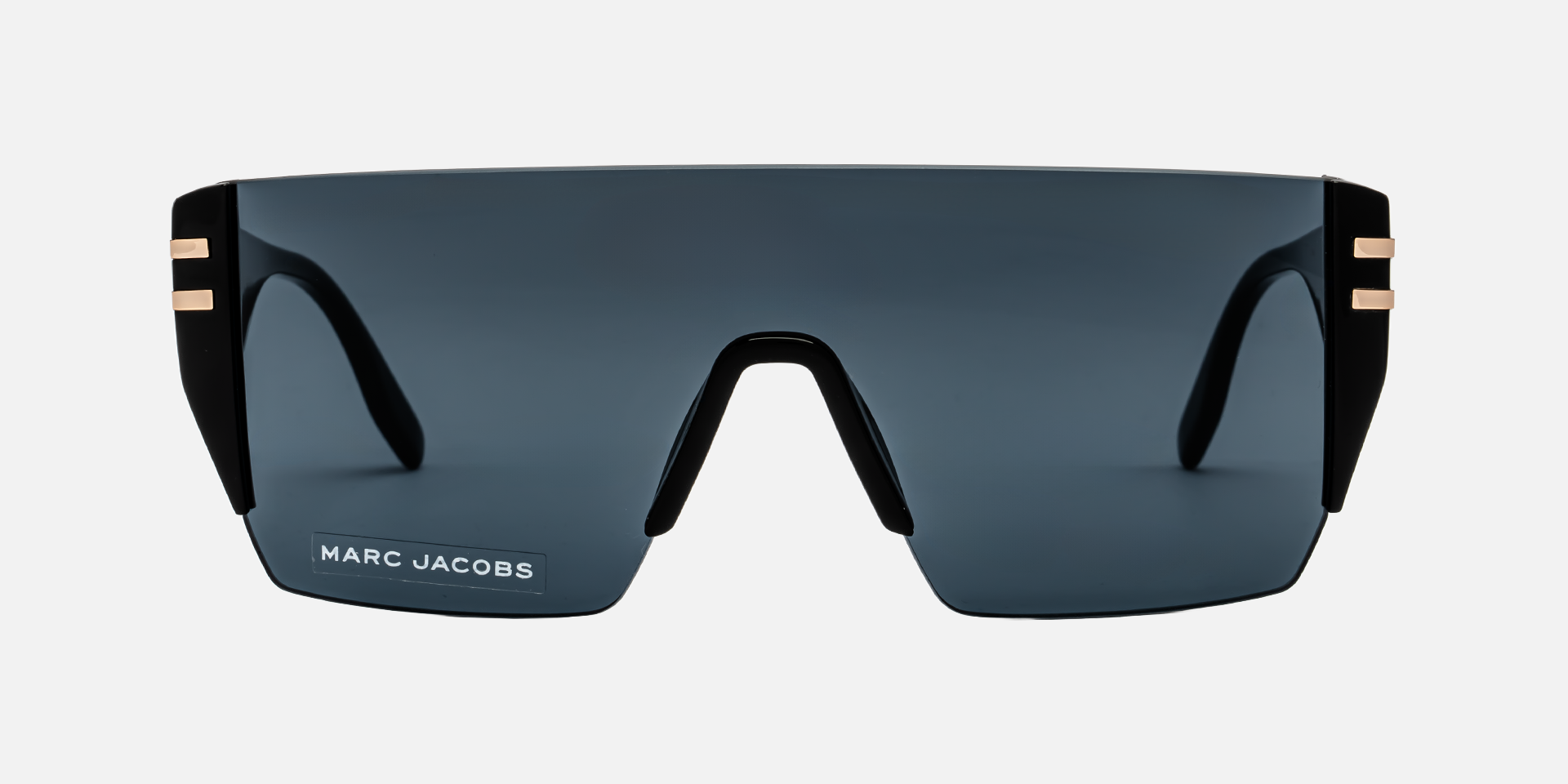 Marc Jacobs Marc 712/S 807/IR mask sunglasses for men in rimless plastic, with black frame, and solid dark grey lenses. 99mm in lens size, 1mm in bridge size, and 145mm in temple length.