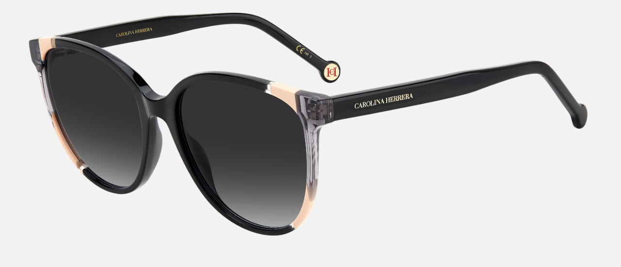 Carolina Herrera CH 0063/S KDX oval sunglasses for women in full rim plastic, with black nude frame, and gradient grey lenses. 58mm in lens size, 17mm in bridge size, and 145mm in temple length.