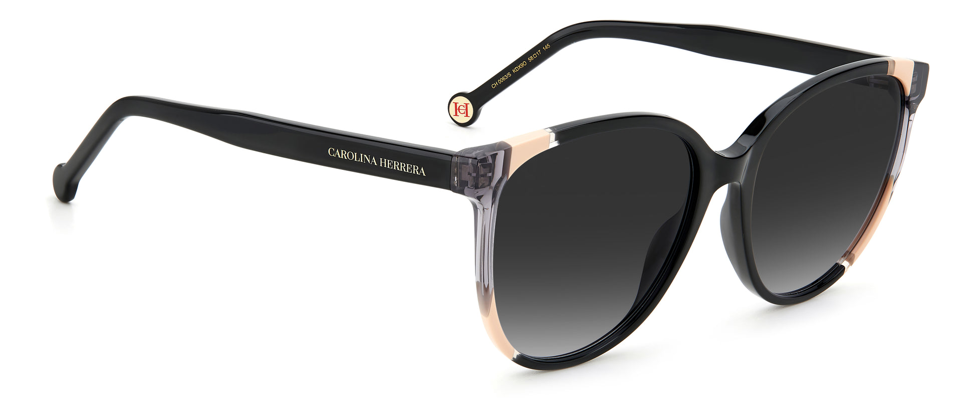 Carolina Herrera CH 0063/S KDX oval sunglasses for women in full rim plastic, with black nude frame, and gradient grey lenses. 58mm in lens size, 17mm in bridge size, and 145mm in temple length.