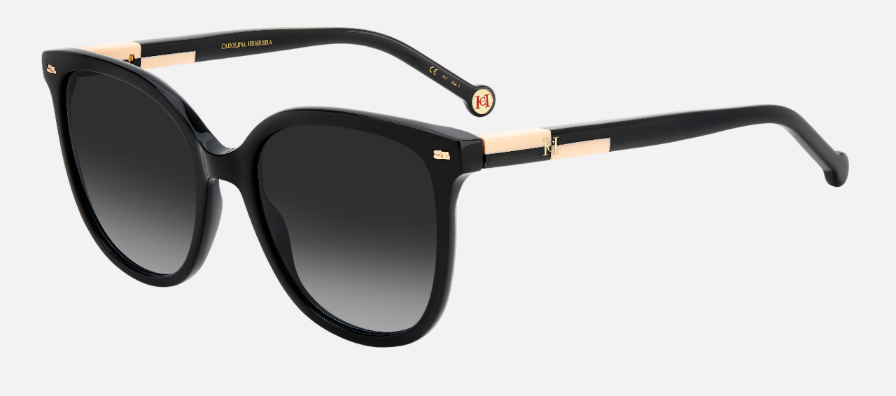 Carolina Herrera HER 0136/S KDX round sunglasses for women in full rim plastic, with black nude frame, and gradient grey lenses. 55mm in lens size, 20mm in bridge size, and 145mm in temple length.