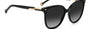 Carolina Herrera HER 0136/S KDX round sunglasses for women in full rim plastic, with black nude frame, and gradient grey lenses. 55mm in lens size, 20mm in bridge size, and 145mm in temple length.