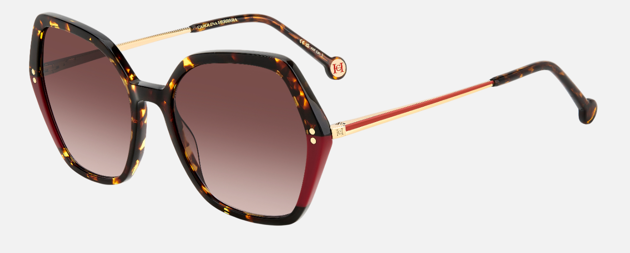 Carolina Herrera HER 0185/S O63 hexagonal sunglasses for women in full rim plastic, with havana red frame, and gradient brown lenses. 55mm in lens size, 18mm in bridge size, and 145mm in temple length.