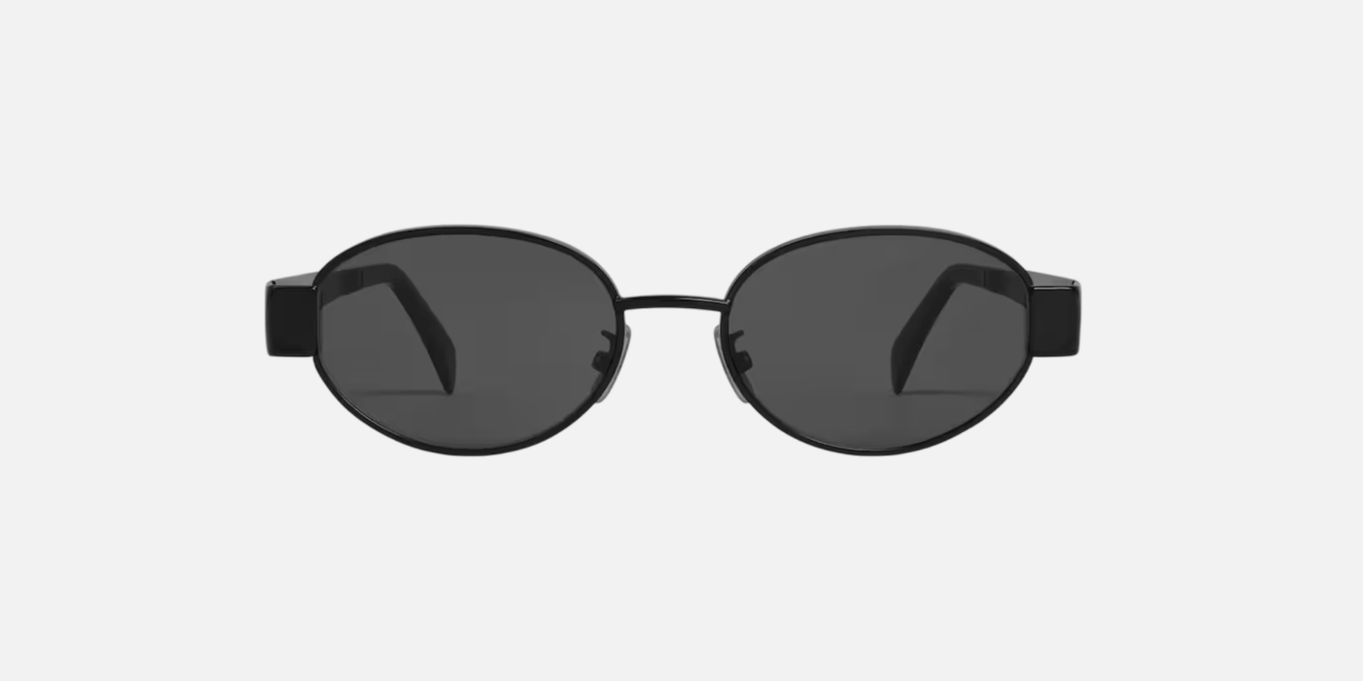 Celine Triomphe Metal 01 CL40235U 01A oval sunglasses for women in full rim metal, with black frame, and smoke lenses. 54mm in lens size, 18mm in bridge size, and 135mm in temple length.