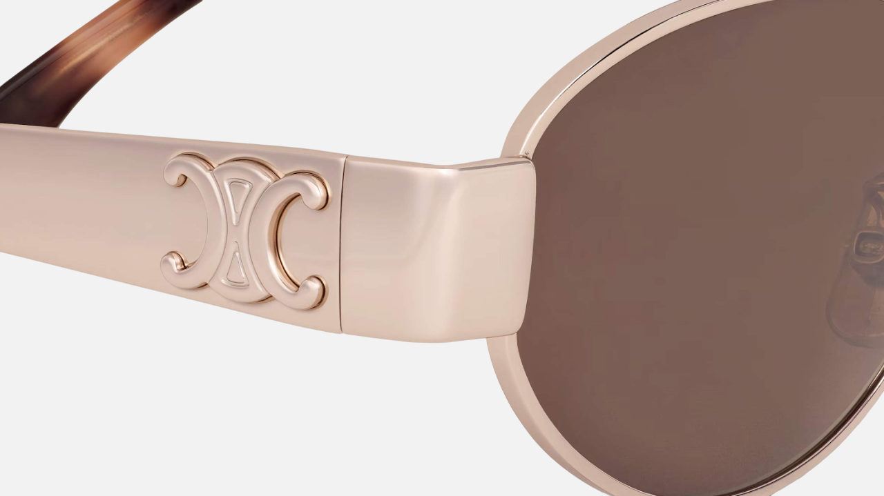 Celine Triomphe Metal 01 CL40235U 28E oval sunglasses for women in full rim metal, with rose gold frame, and brown lenses. 54mm in lens size, 18mm in bridge size, and 135mm in temple length.