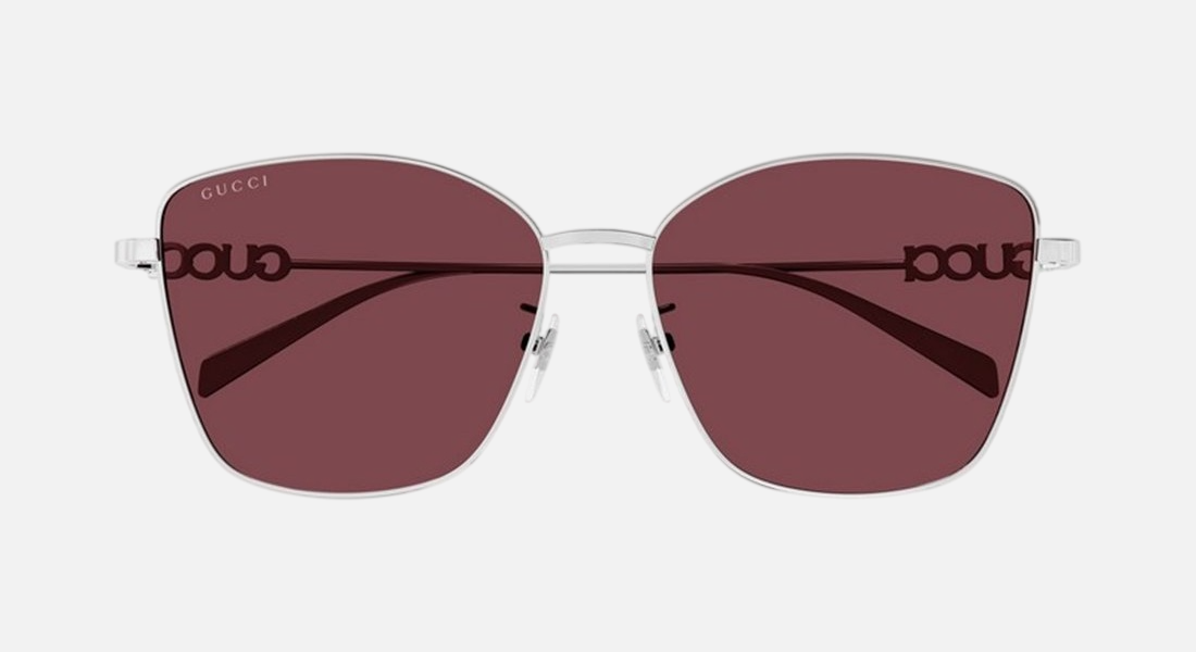 Gucci GG1805SA 004 cat eye sunglasses for women in full rim metal, with silver frame, and red lenses. 60mm in lens size, 15mm in bridge size, and 145mm in temple length.