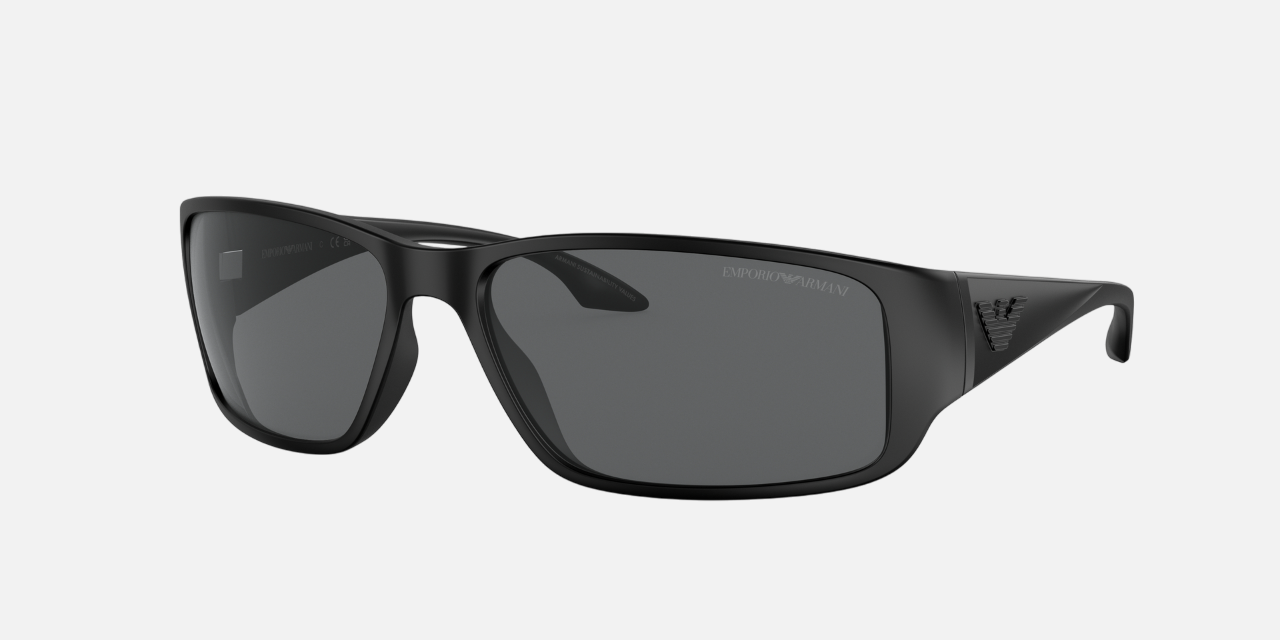 Emporio Armani EA 4191U 506387 rectangular sunglasses for men in full rim plastic, with rubberised black frame, and dark grey lenses. 64mm in lens size, 16mm in bridge size, and 130mm in temple length.