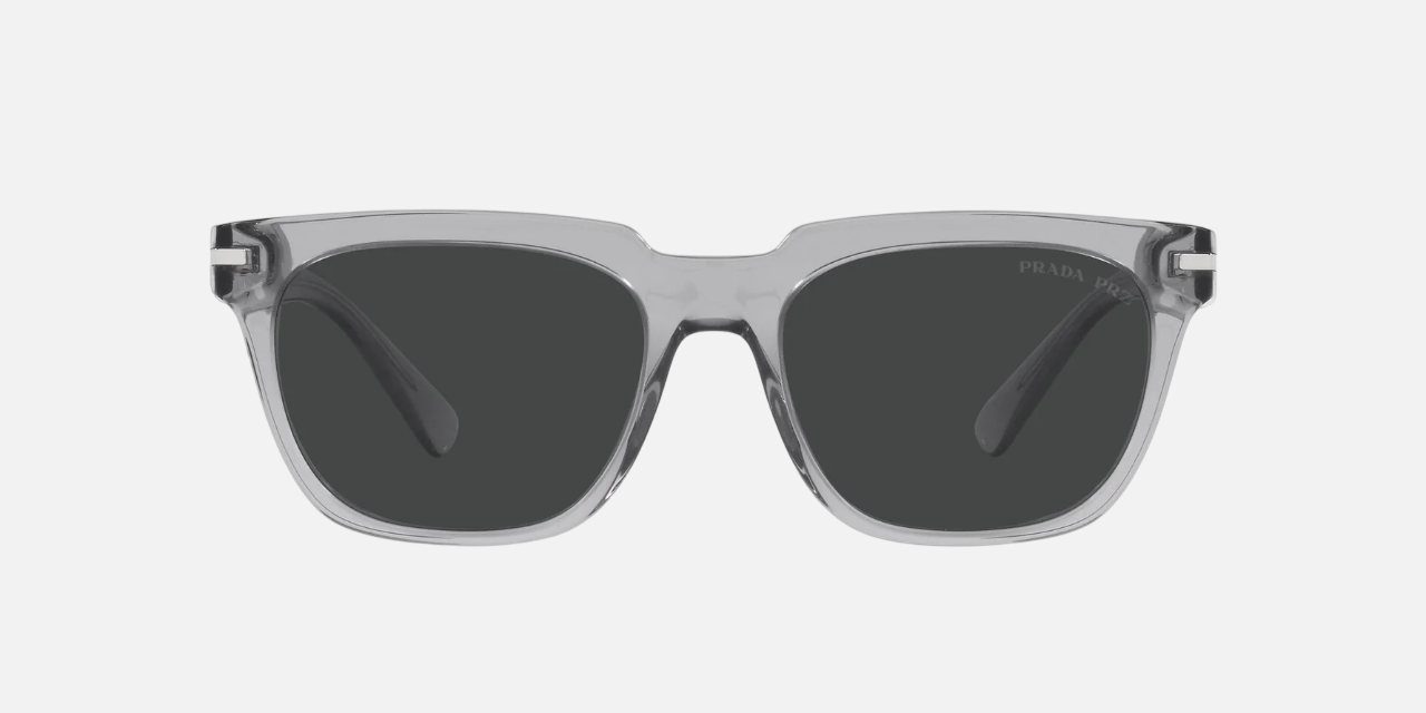 Prada PR 04YS 08U08G square sunglasses for men in full rim acetate, with transparent grey frame, and black lenses. 56mm in lens size, 19mm in bridge size, and 150mm in temple length.