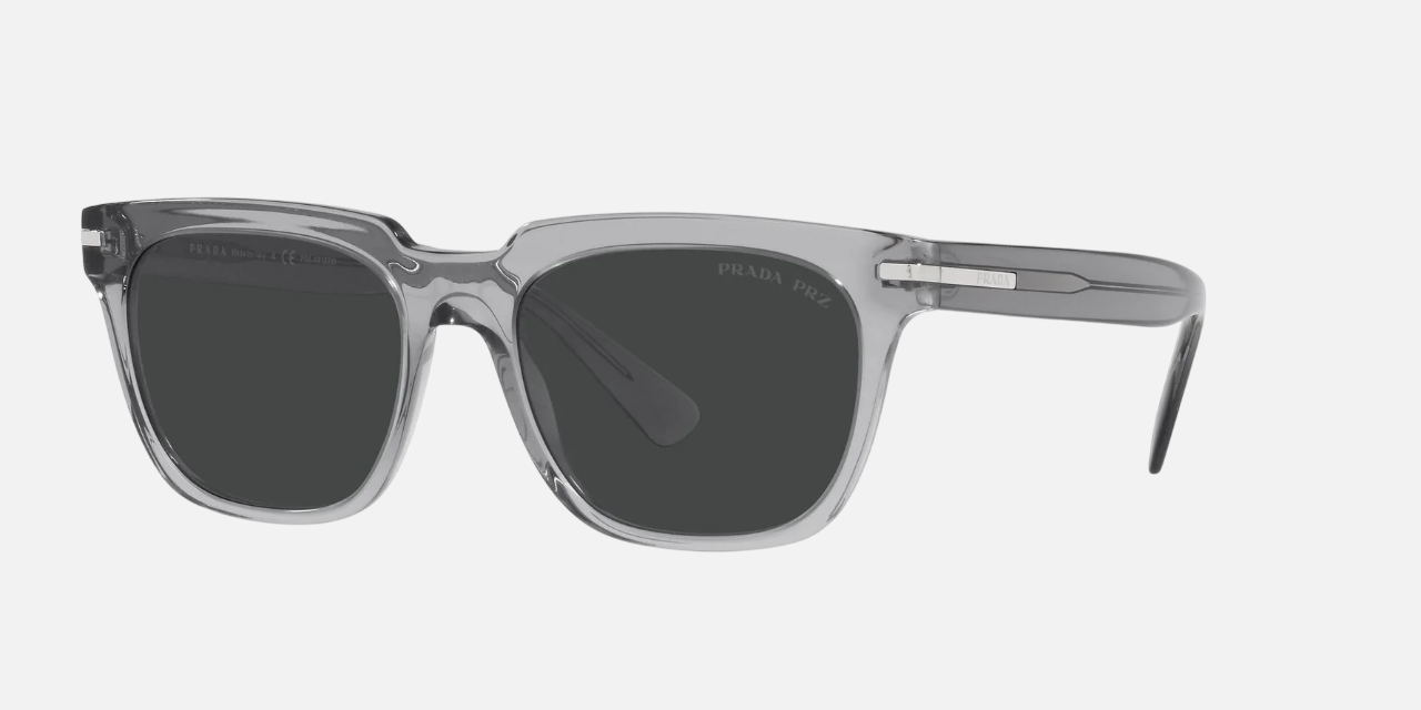 Prada PR 04YS 08U08G square sunglasses for men in full rim acetate, with transparent grey frame, and black lenses. 56mm in lens size, 19mm in bridge size, and 150mm in temple length.