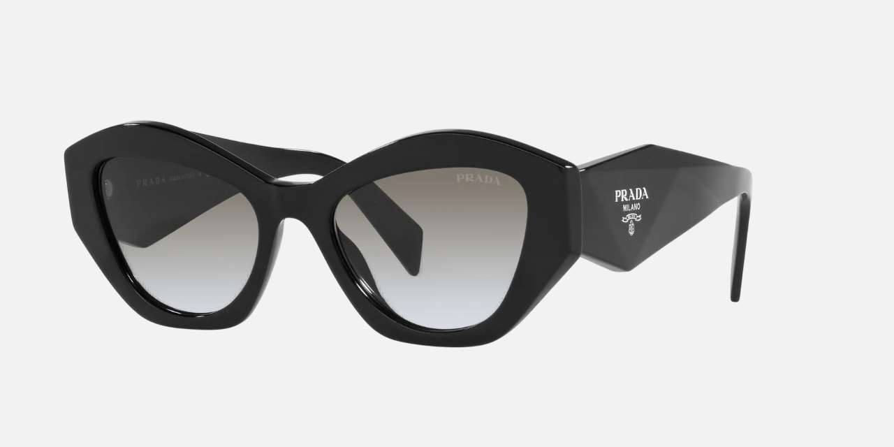 Prada PR 07YS 1AB0A7 cat eye sunglasses for women in full rim acetate, with black frame, and grey gradient lenses. 53mm in lens size, 19mm in bridge size, and 145mm in temple length.