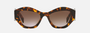 Prada PR 07YS VAU6S1 cat eye sunglasses for women in full rim acetate, with havana frame, and brown gradient lenses. 53mm in lens size, 19mm in bridge size, and 145mm in temple length.