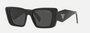 Prada PR 08YS 1AB5S0 butterfly sunglasses for women in full rim acetate, with black frame, and grey lenses. 51mm in lens size, 18mm in bridge size, and 145mm in temple length.