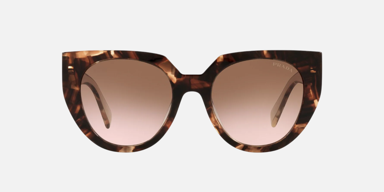 Prada PR 14WS 01R0A6 cat eye sunglasses for women in full rim acetate, with caramel tortoise frame, and brown gradient lenses. 52mm in lens size, 20mm in bridge size, and 140mm in temple length.