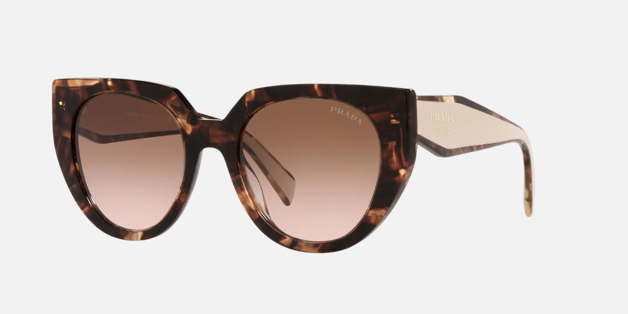 Prada PR 14WS 01R0A6 cat eye sunglasses for women in full rim acetate, with caramel tortoise frame, and brown gradient lenses. 52mm in lens size, 20mm in bridge size, and 140mm in temple length.