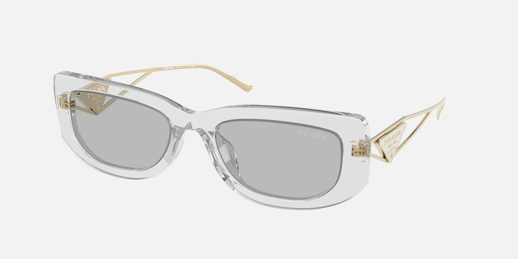 Prada PR 14YS 12R50K rectangular sunglasses for women in full rim acetate, with transparent grey frame, and light grey lenses. 53mm in lens size, 19mm in bridge size, and 140mm in temple length.