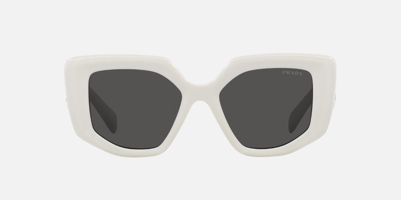 Prada PR 14ZS 1425S0 irregular sunglasses for women in full rim acetate, with talcum white frame, and dark grey lenses. 50mm in lens size, 18mm in bridge size, and 140mm in temple length.