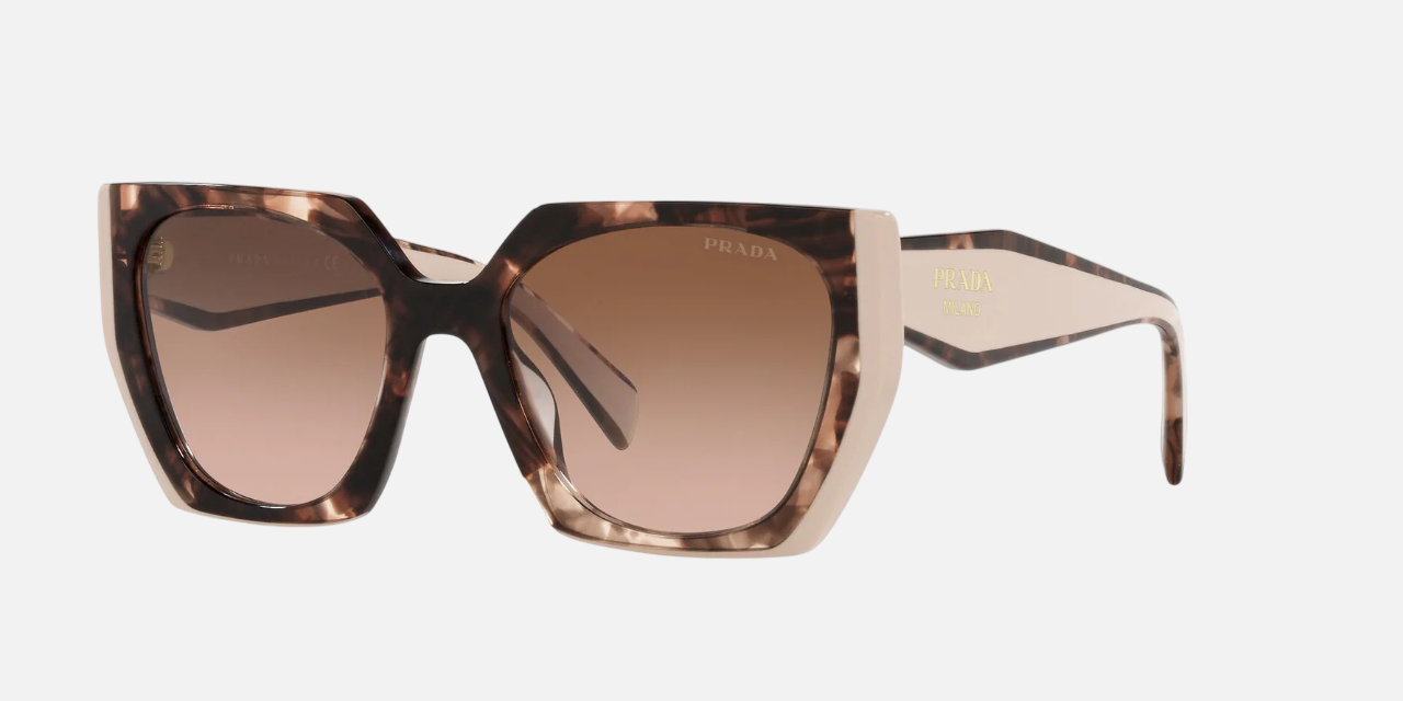 Prada PR 15WS 01R0A6 irregular sunglasses for women in full rim acetate, with havana frame, and brown gradient lenses. 54mm in lens size, 19mm in bridge size, and 140mm in temple length.