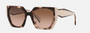 Prada PR 15WS 01R0A6 irregular sunglasses for women in full rim acetate, with havana frame, and brown gradient lenses. 54mm in lens size, 19mm in bridge size, and 140mm in temple length.