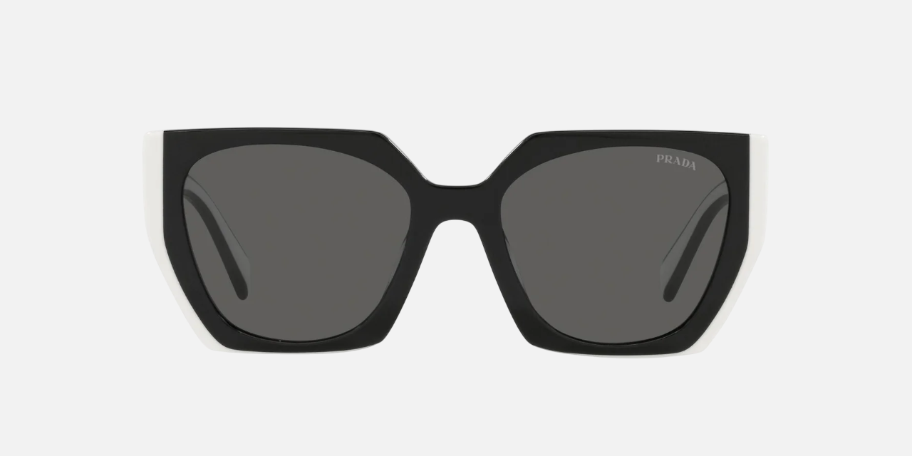 Prada PR 15WS 09Q5S0 irregular sunglasses for women in full rim acetate, with black talc frame, and dark grey lenses. 54mm in lens size, 19mm in bridge size, and 140mm in temple length.
