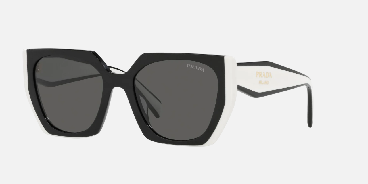 Prada PR 15WS 09Q5S0 irregular sunglasses for women in full rim acetate, with black talc frame, and dark grey lenses. 54mm in lens size, 19mm in bridge size, and 140mm in temple length.